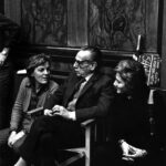 Eduardo De Filippo with Liliana Cavani and Esa De Simone visiting the set of The Night Porter. Photo by Mario Tursi - The Night Porter, 1974